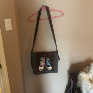 Italian leather satchel bag with converse detail.